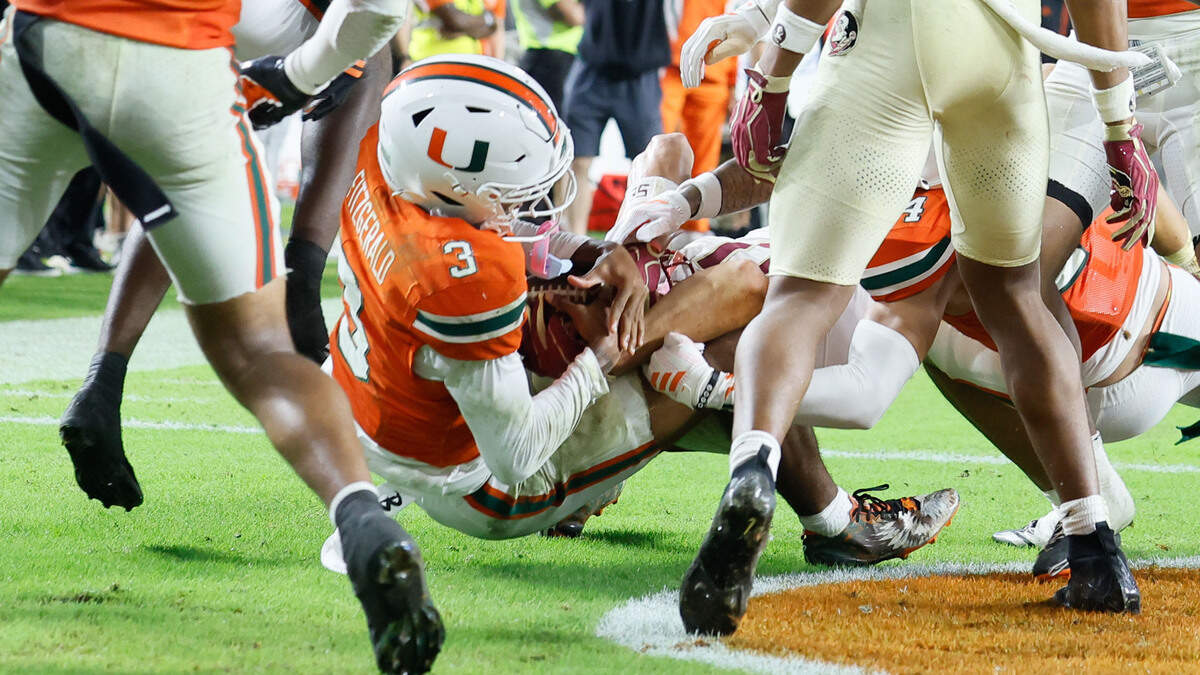 Miami Hurricanes defensive back Bryce Fitzgerald (3) intercepts the pass for a touchback during the second overtime against the Florida State Seminoles at Hard Rock Stadium in Miami Gardens, Florida, on Saturday, October 17, 2026.